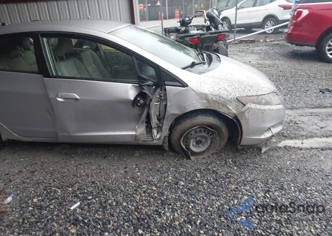 2010 Honda Insight Lx z USA, uszkodzony, nr VIN JHMZE2H50AS022220